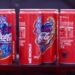 Në kanaçet e Coca-Cola, zemra e shqipes dykrenarë nga koleksioni i kryeministrit Edi Rama