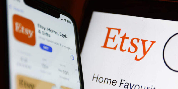 Etsy on App Store displayed on a phone screen and Etsy website displayed on a laptop screen are seen in this illustration photo taken in Krakow, Poland on August 3, 2023. (Photo by Jakub Porzycki/NurPhoto via Getty Images)